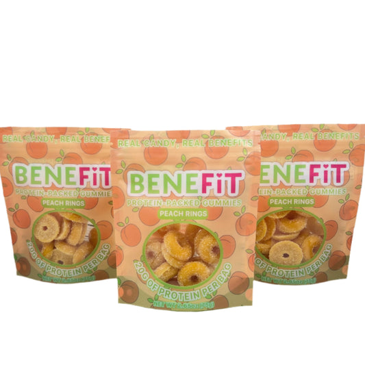 Three packages of 'BeneFit' snack mix on a white surface with a neutral background